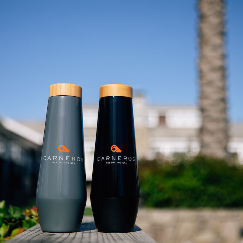 Two bottles with wooden caps and 